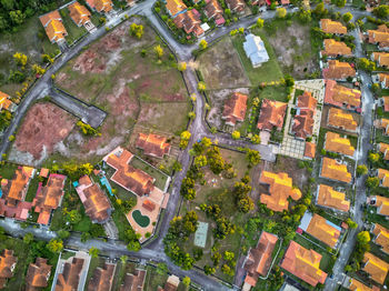 High angle view of buildings and street in city