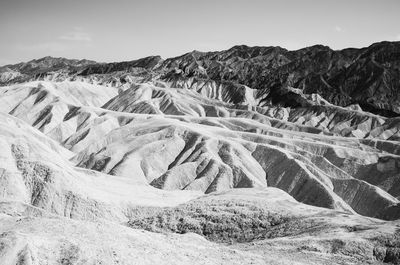 Scenic view of landscape and mountains against sky