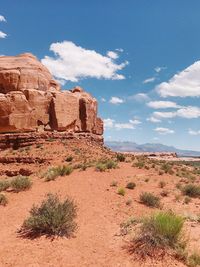 Rock formations on landscape against sky