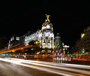 Light trails on city street at night