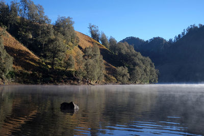 Morning atmosphere in ranu kumbolo, a freshwater lake located at an altitude