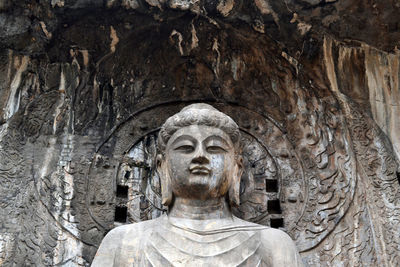 Low angle view of buddha statue