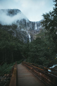 View on a big waterfall on a rainy and foggy day somewhere in central norway 