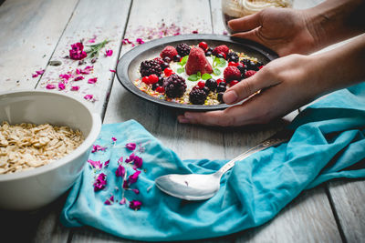 High angle view of man holding bowl