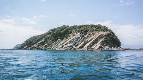 Scenic view of island in sea