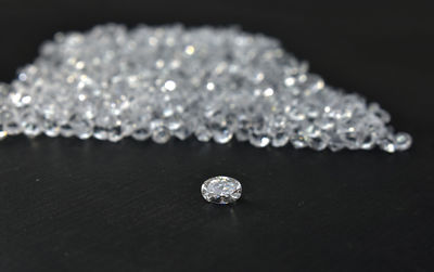 High angle view of ring on table against black background