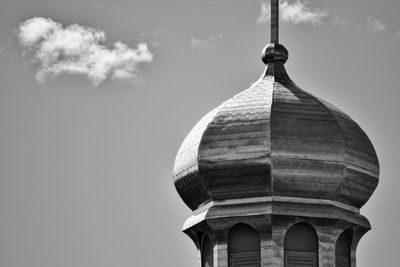 Low angle view of bell tower against sky