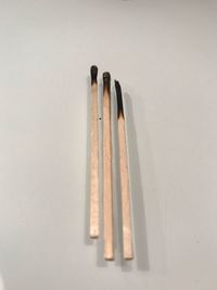 Close-up of pencils against white background