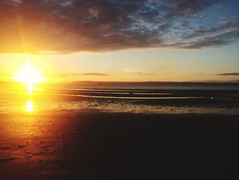 Scenic view of sea at sunset