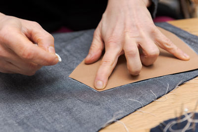 Close-up of person working on table