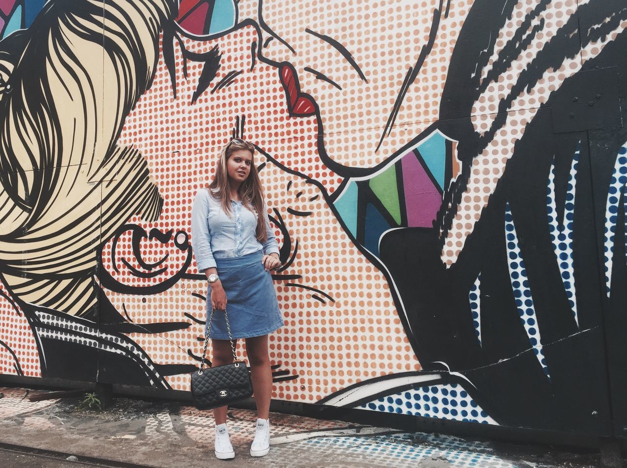 art, graffiti, creativity, art and craft, wall - building feature, full length, lifestyles, leisure activity, person, mural, young adult, street art, casual clothing, outdoors, day