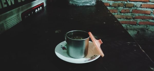 High angle view of coffee cup on table