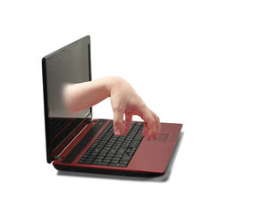 Low angle view of person using mobile phone against white background