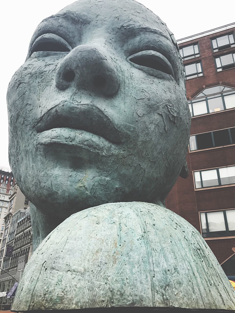 statue, human face, close-up, headshot, human body part, sculpture, real people, day, outdoors, people