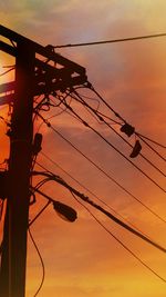 Low angle view of electricity pylon