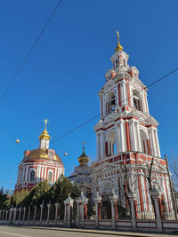 Low angle view of building against blue sky