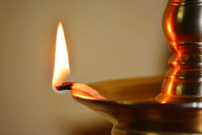 Close-up of illuminated diya