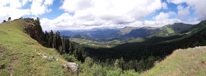 Panoramic view of landscape and mountains against sky