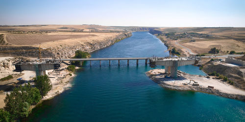 Aerial view of bridge over euphrates river under construction