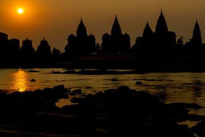 Silhouette of temple at sunset