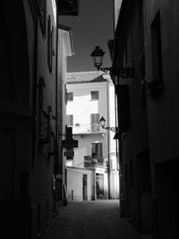 Alley amidst buildings in city