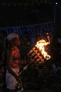 A devotee serving god.