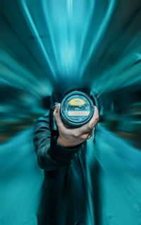 Close-up of hand holding illuminated light