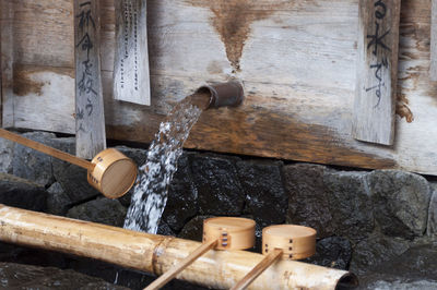 Wooden ladles at chozuya