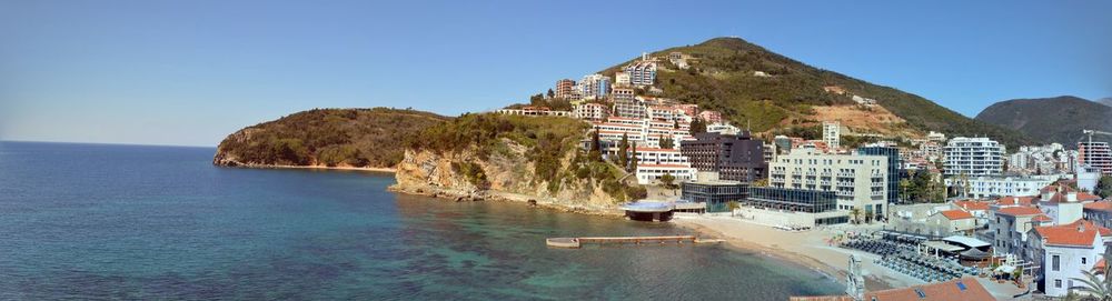 Scenic view of sea against clear blue sky