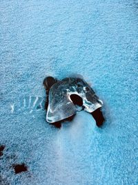 High angle view of ice on frozen sea