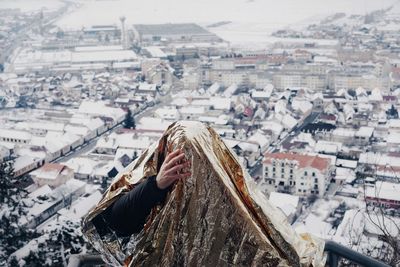 High angle view of woman in city during winter