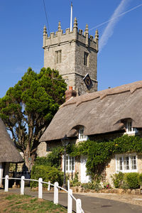 Exterior of historic building against clear blue sky