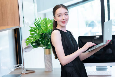 Young woman using mobile phone