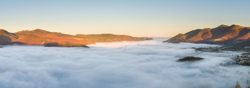Panoramic view of mountains against sky during sunset