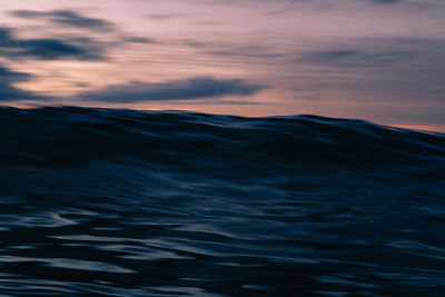 Wave breaking with slow exposure under clouds