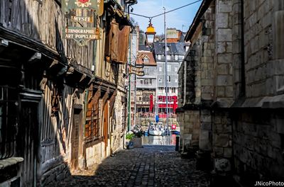 Street amidst buildings in city