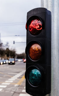 Close-up of traffic signal on road