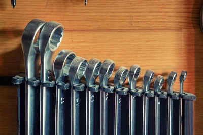 Close-up of metal equipment on table