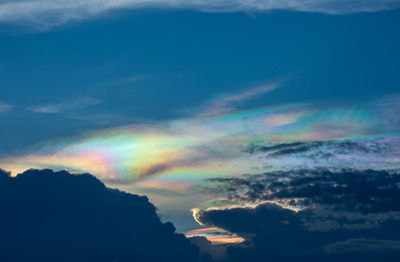 Low angle view of rainbow in sky