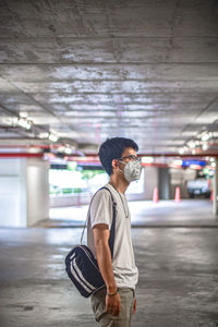 Full length of young man looking at camera