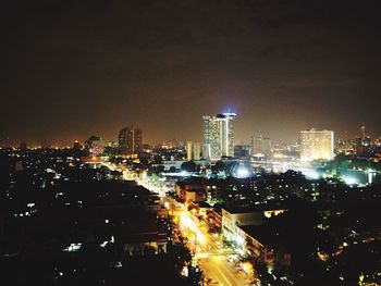 Illuminated cityscape at night