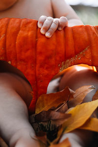 Cropped hand of person holding food