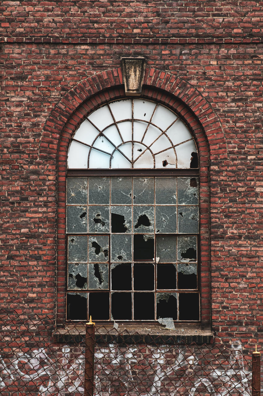 WINDOW ON OLD BUILDING