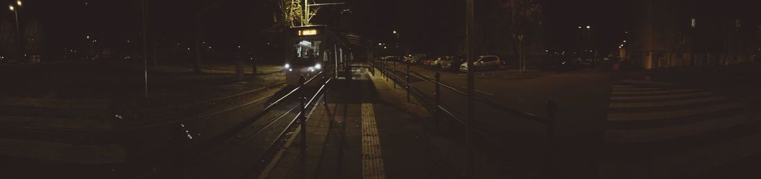 Illuminated street lights at night