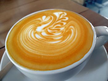 High angle view of cappuccino on table