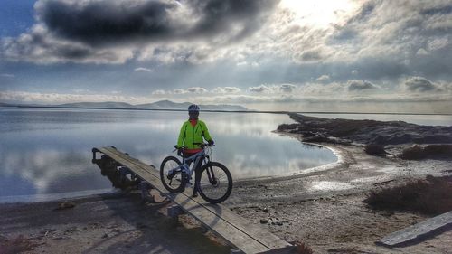 Scenic view of sea against cloudy sky