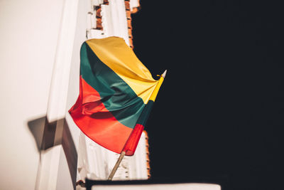 Low angle view of flag against sky