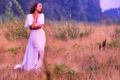 Woman standing on field