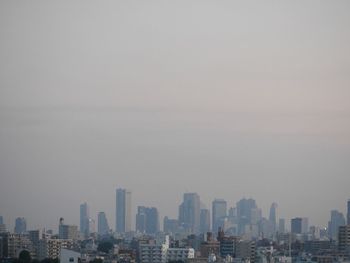 Cityscape against clear sky