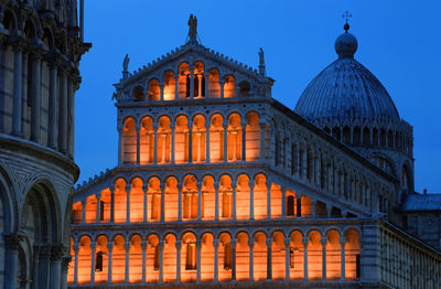 Low angle view of illuminated pisa cathedral against clear sky